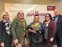 Josie Rodriguez, February Sunflower Award Winner, with OSF Saint Elizabeth Leadership.