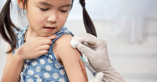 child getting flu vaccine