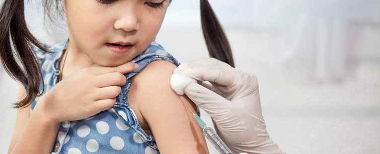 child getting flu vaccine