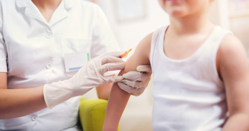 child getting vaccines