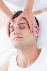 man gets head massage