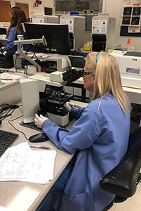 Vicky Hoagland, Clinical Laboratory Technician. She is working in our Hematology department, scanning peripheral blood for abnormal findings.