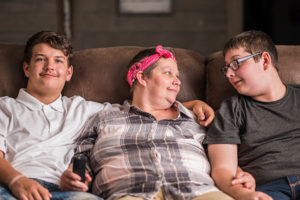 Crystal Dolbee and sons on couch