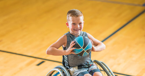 Brantley Williams in wheelchair on the basketball court