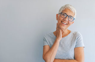 Middle-Aged Woman with glasses after colon cancer screening