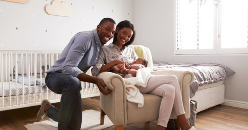 African-American couple with infant son in need of pediatrician