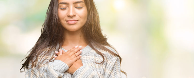 woman taking a self-compassion break