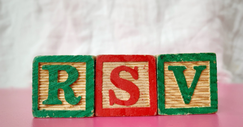 three childrens blocks spell out "RSV"