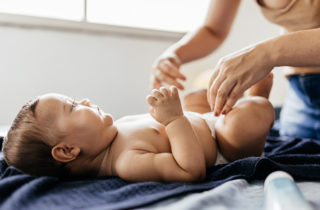 how do babies get diaper rash, mom changing baby's diaper