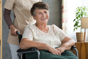 female palliative care patient in a wheelchair