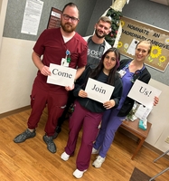 Nurses with Join Us signs