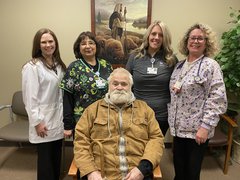 Pictured is David Graff, a patient of OSF Wound Care, with Brittany Jones, DPM, a podiatrist and podiatric surgeon who cares for patients at OSF Wound Care in Ottawa, along with Mission Partners from the clinic.